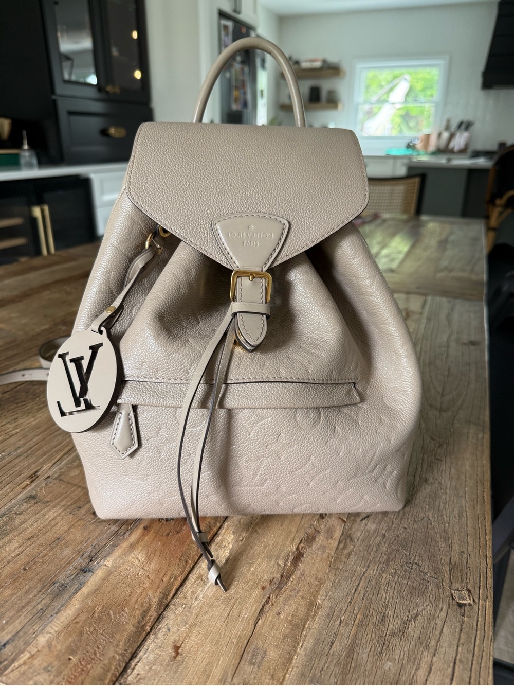 Louis Vuitton Light Taupe Leather Backpack with LV Charm